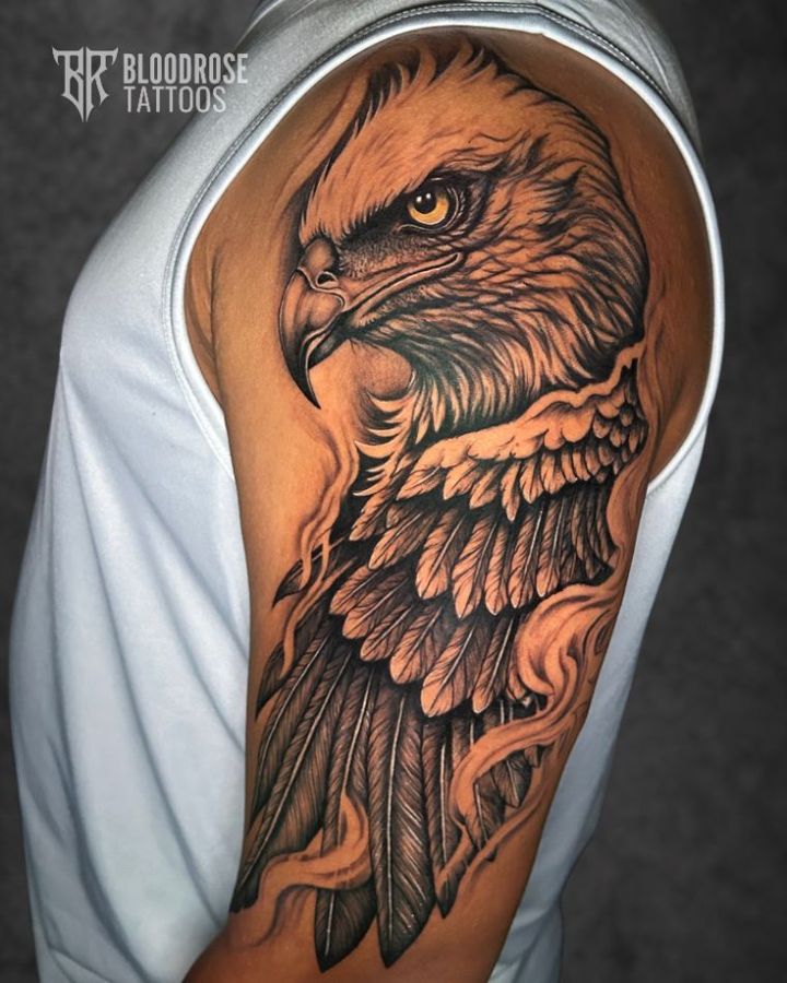 Realistic eagle tattoo on the upper arm